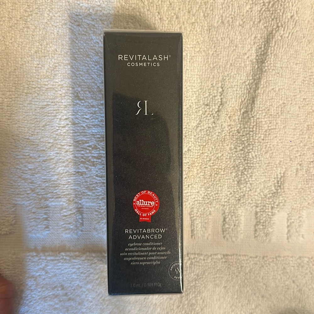 Selling the RevitaLash Cosmetics Eyebrow conditioner. The product is unopened.